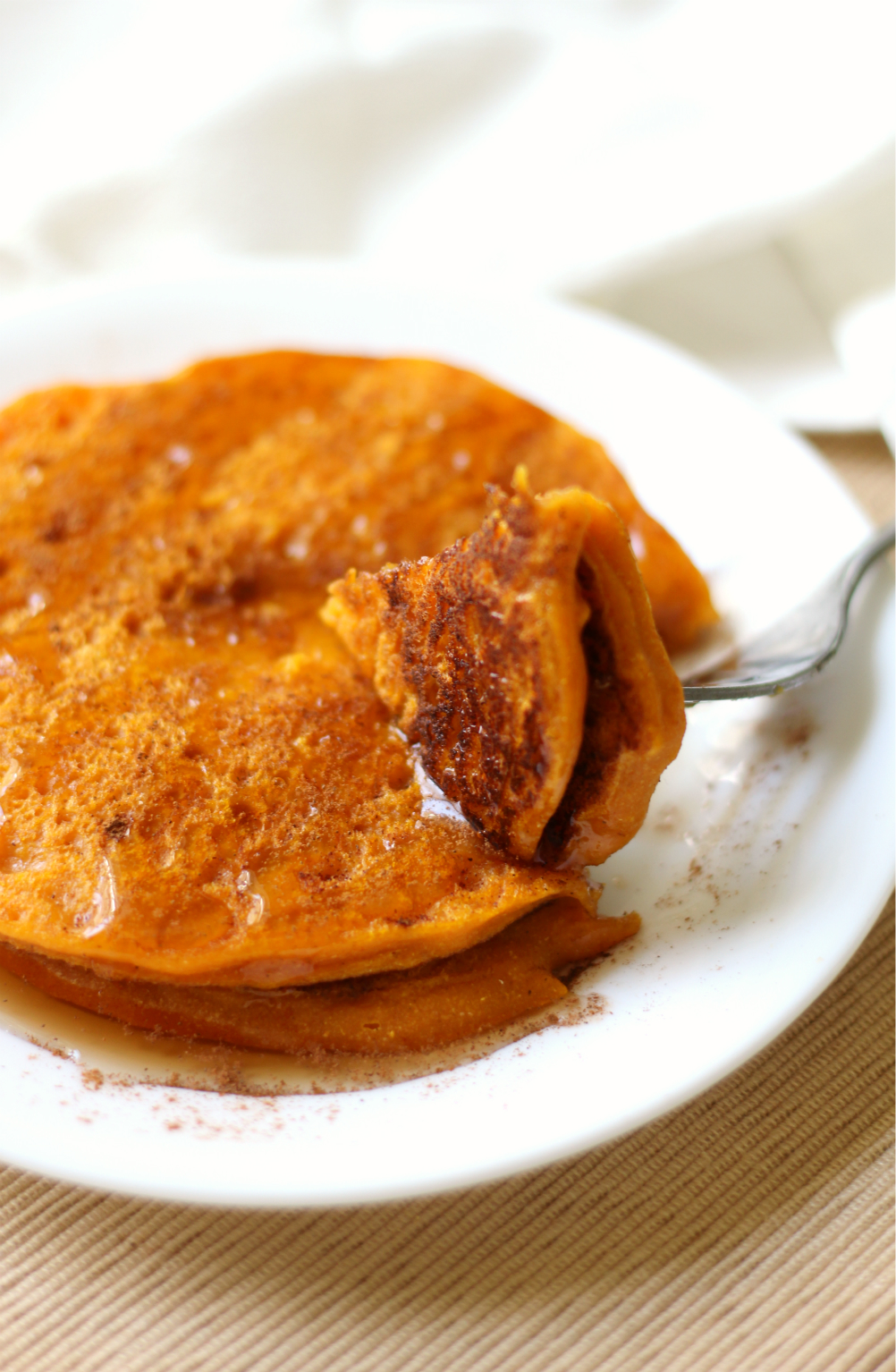Pumpkin Pancakes | Strength and Sunshine @RebeccaGF666 Simple and delicious pumpkin pancakes in a snap! Gluten-free, vegan, and single-serve, these pancakes are healthy and make a perfect seasonal breakfast recipe any day of the week!