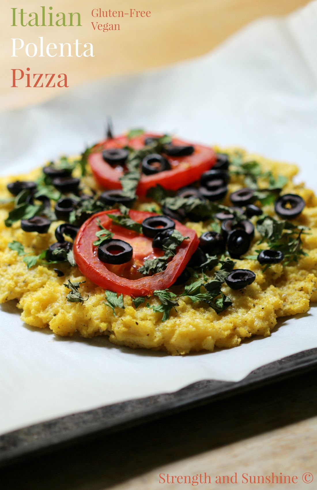 Italian Polenta Pizza | Strength and Sunshine @RebeccaGF666 A simple polenta crust pizza topped with fresh basil, parsley, sliced black olives and ripe red tomato. An Italian classic made gluten-free and vegan without missing one hint of flavor! #CalOlivesMedRecipe