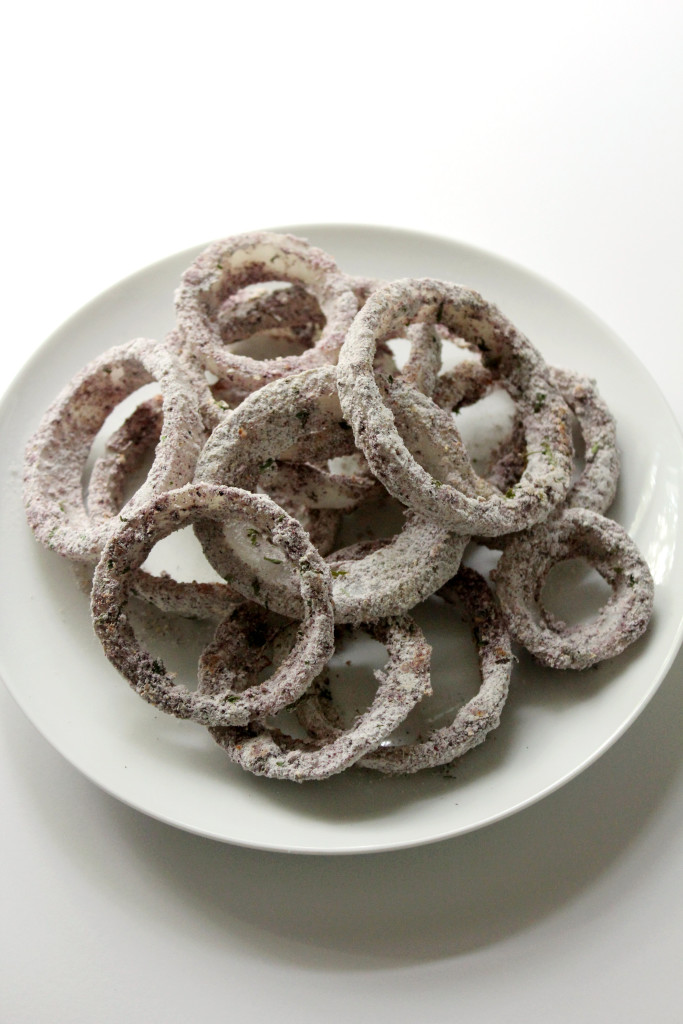 Blue Cornmeal Baked Onion Rings | Strength and Sunshine @RebeccaGF666 Healthy baked onion rings coated with blue cornmeal. No oil, gluten-free, and vegan, perfect to satisfy that "fried & fast" comfort food craving! Snacking, tailgating, or as a dinner side dish!