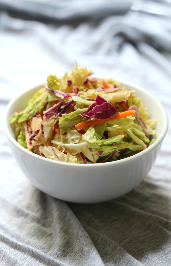 Smokey & Sweet Peanut Slaw | Strength and Sunshine @RebeccaGF666 Smokey and sweet, this slaw has it all. Crunchy cabbage,  crispy Asian pear, shredded carrots, and a smoky peanut sauce to bring it all together. This gluten-free and vegan side dish will bring new meaning to the term coleslaw.