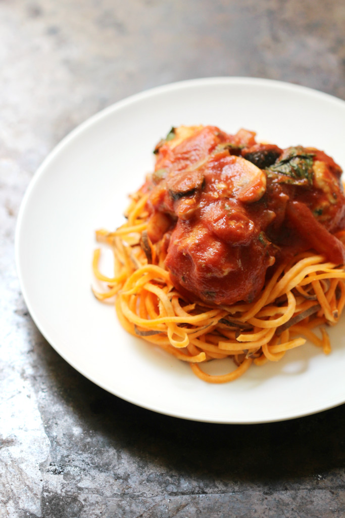 Italian Chicken Meatballs & Sweet Potato Spaghetti | Strength and Sunshine @RebeccaGF666 Italian chicken meatballs baked and simmered in a homemade tomato sauce, served over easy sweet potato spaghetti. Gluten-free, allergy-free, and paleo, this delicious version of the classic will quickly become a new family dinner favorite. #sponsored #TheRecipeReDux
