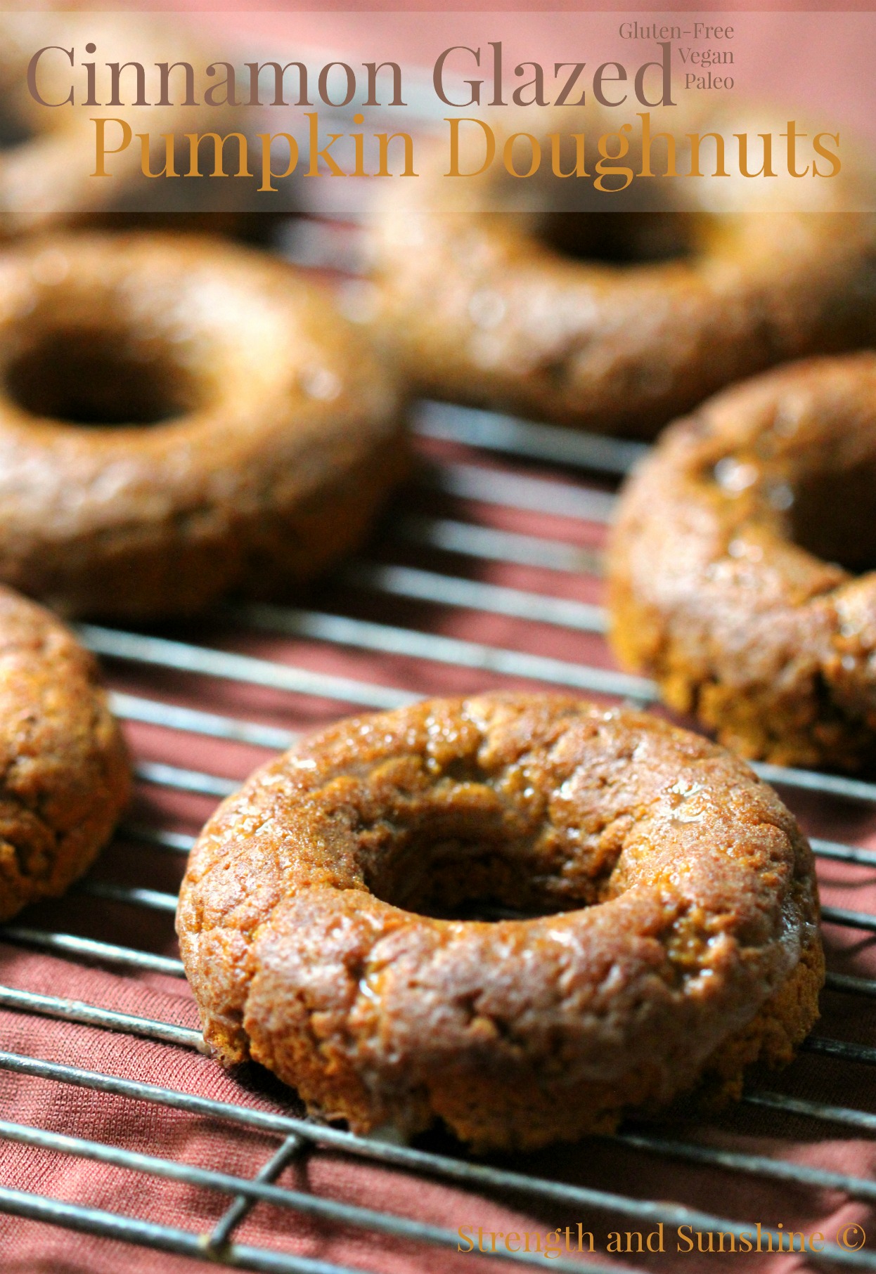 Cinnamon Glazed Pumpkin Doughnuts | Strength and Sunshine @RebeccaGF666 Your morning coffee companion just got sweeter. Cinnamon Glazed Pumpkin Doughnuts, baked to perfection and loaded with pumpkin. Gluten-free, vegan, and paleo, the flavors of fall will keep everyone warm and cozy!