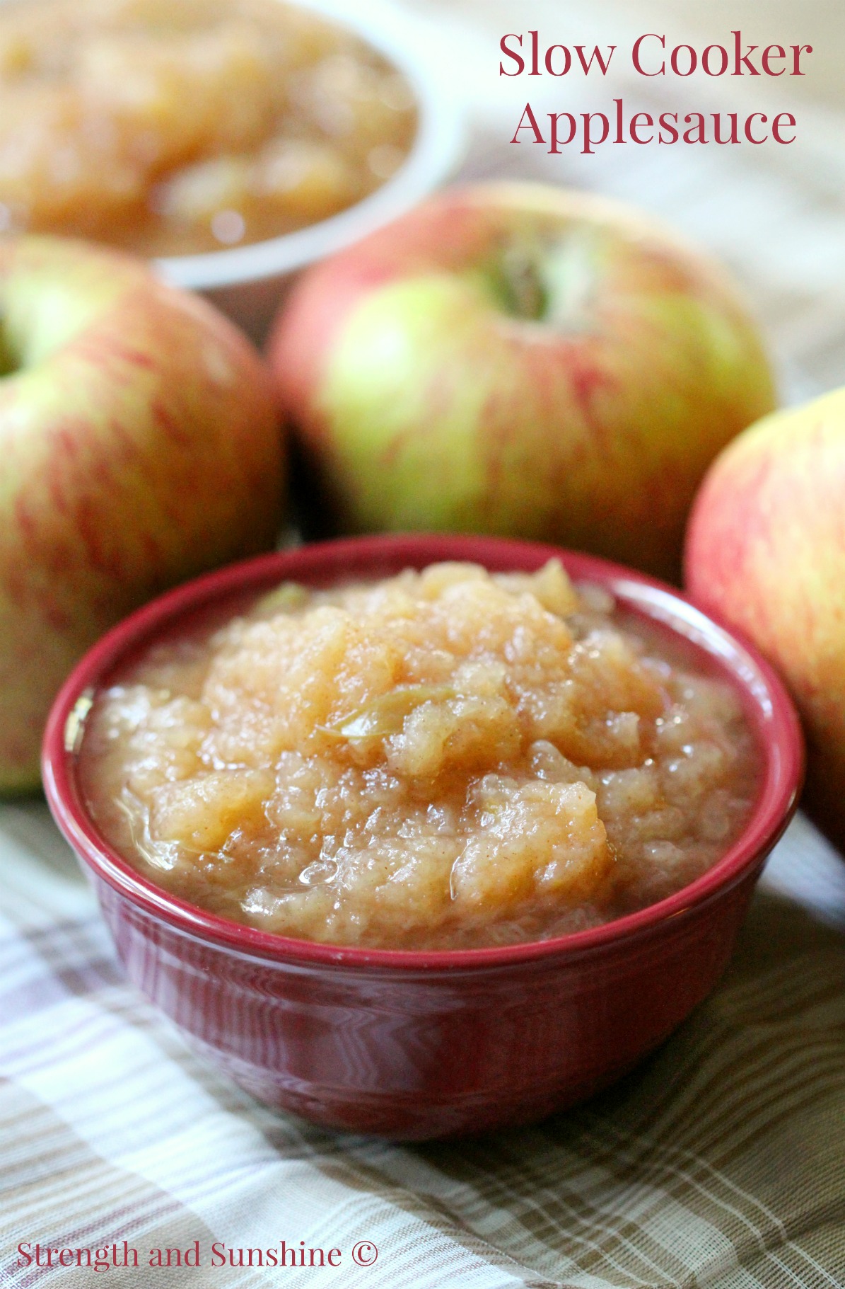 Slow Cooker Applesauce | Strength and Sunshine @RebeccaGF666 Nothing smells more like autumn comfort than apples simmering in the slow cooker! Easy homemade slow cooker applesauce with none of the work, hassles, or added sugar. Add some cinnamon and spice or keep it plain; the final product is up to you but will always be delicious! The perfect gluten-free and vegan sweet snack!