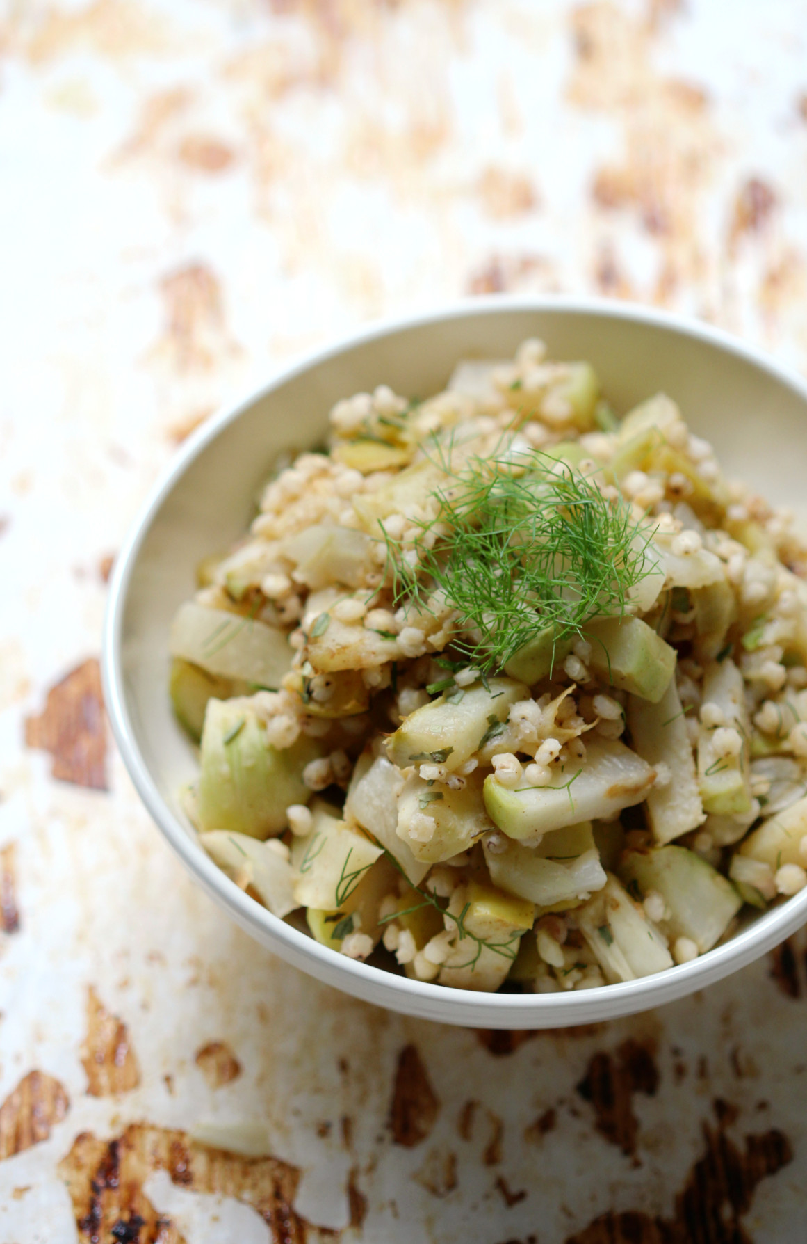 Warm Sorghum Salad with Roasted Kohlrabi, Apple, & Fennel | Strength and Sunshine @RebeccaGF666 A warm sorghum salad paired with roasted kohlrabi, ginger gold apple, and fennel. This gluten-free vegan recipe is slightly sweet, comforting, and nourishing for the cold months ahead. A perfect healthy whole grain side dish.