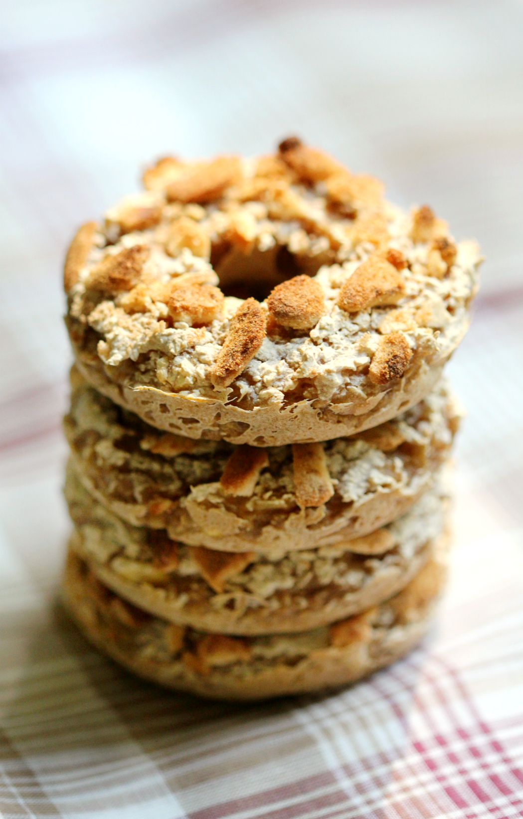 Apple Cinnamon Crumble Doughnuts | Strength and Sunshine @RebeccaGF666 All the seasonal flavors of an apple crumble in the form of an easy allergy-friendly baked doughnut! These apple cinnamon crumble doughnuts allow you to take your crumble on the go without the need for a fork or spoon! A healthy gluten-free, nut-free, vegan, and paleo breakfast or dessert recipe! 