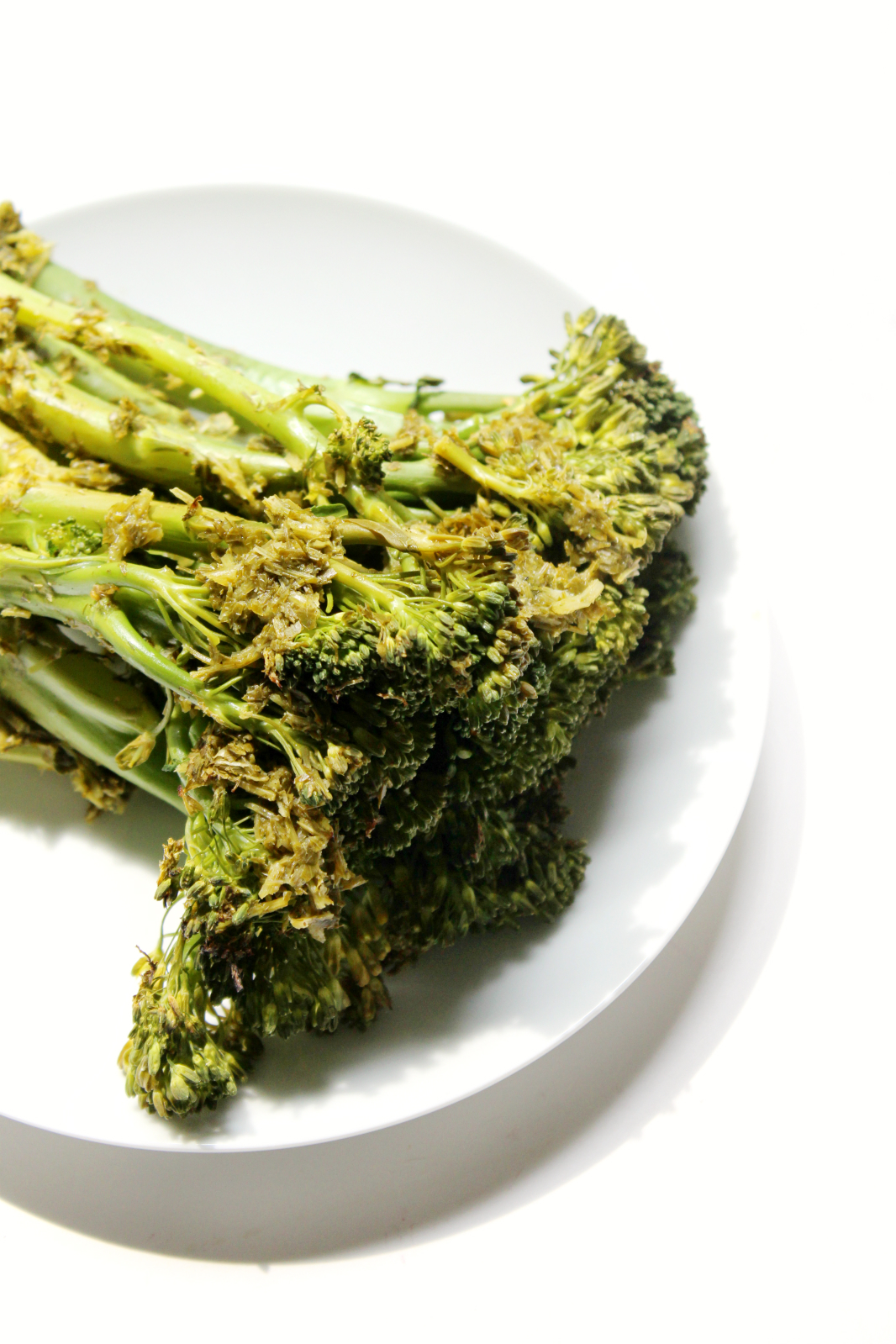 Roasted Broccolini with Lemon & Garlic Herb Sauce | Strength and Sunshine @RebeccaGF666 A simply refreshing way to bring some flavor to roasted broccolini. An easy and delicious vegetable side dish, to complement any meal, with loads of fresh herbs, lemon, and garlic. Gluten-free, vegan, paleo, dairy-free, and healthy.