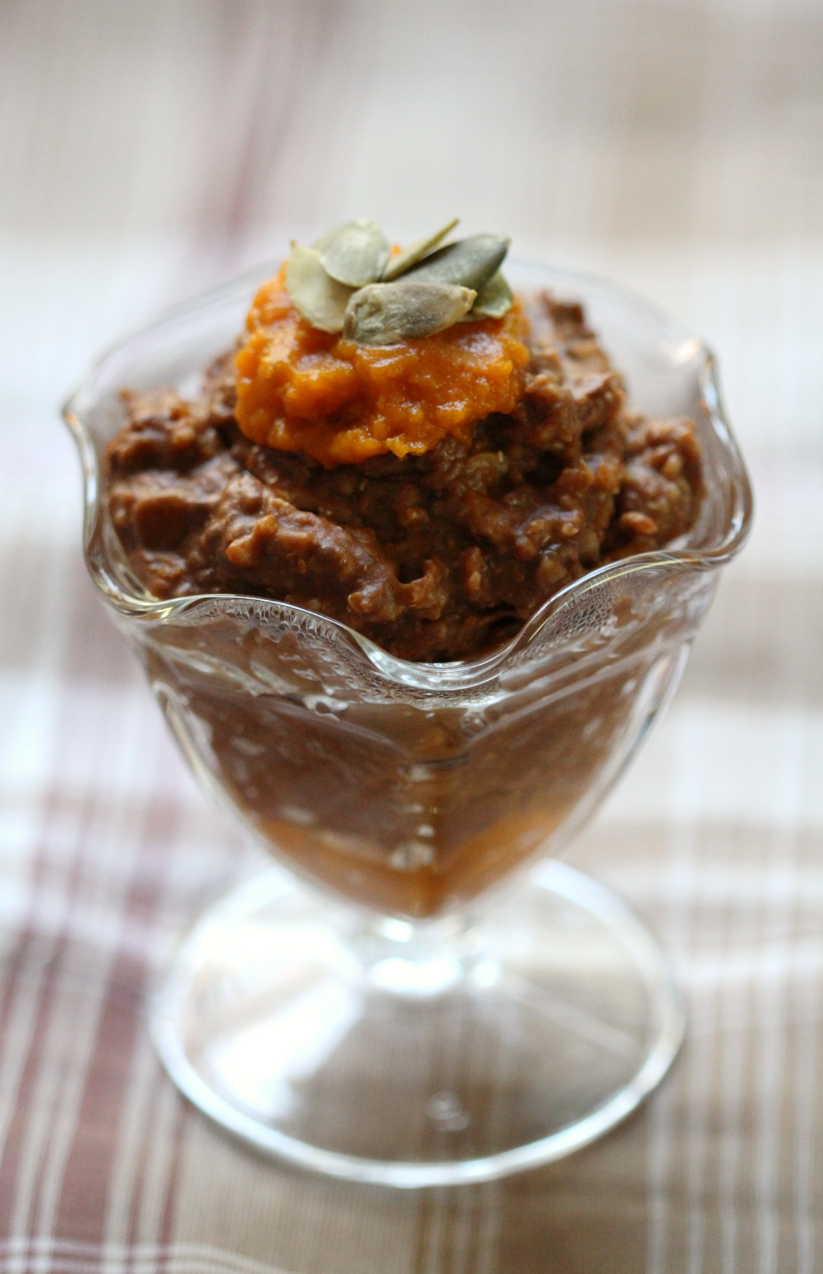 Seedy Chocolate Oatmeal Parfait | Strength and Sunshine @RebeccaGF666 A speedy seedy chocolate pumpkin oatmeal parfait that's gluten-free and vegan. Healthy fats, cocoa, and whole grains make this the perfect comforting breakfast recipe to fuel and start your day with on a chilly morning!