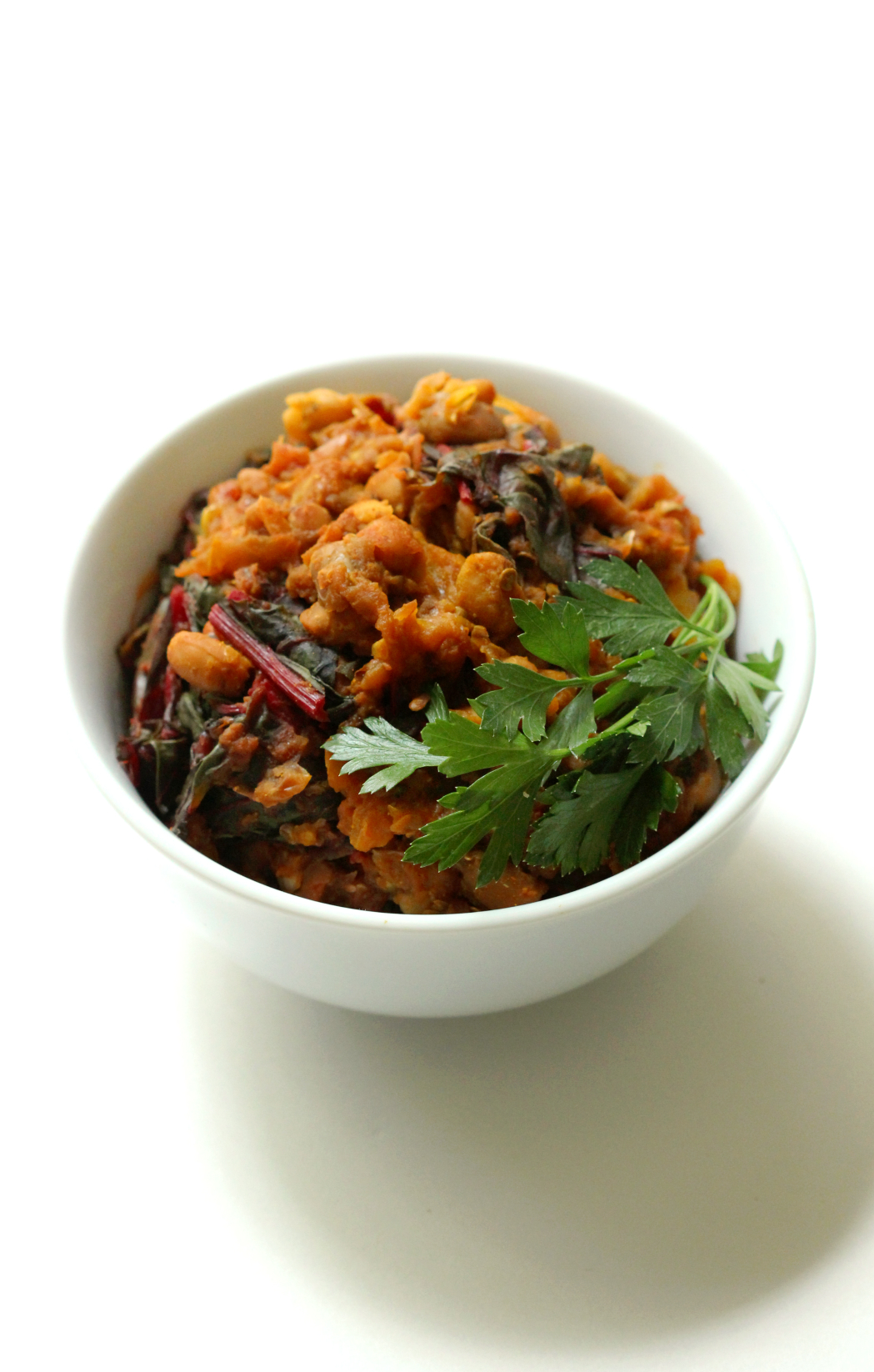 Black Eyed Pea Curry with Swiss Chard & Roasted Eggplant | Strength and Sunshine @RebeccaGF666 An easy quick curry for a warming meal any night of the week. Black Eyed Pea Curry with Swiss Chard & Roasted Eggplant is packed with creamy veggie power to satisfy even this biggest plant-based skeptic! A perfect gluten-free, vegan, meatless dinner recipe.