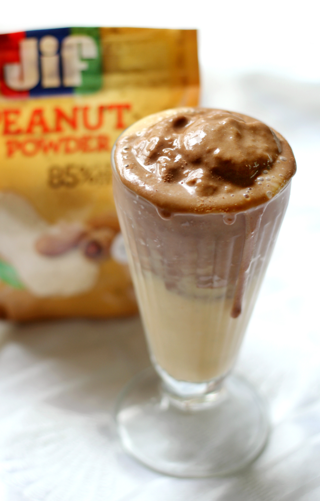 Peanut Butter Cup Protein Smoothie | Strength and Sunshine @RebeccaGF666 An easy protein smoothie recipe that tastes just like a peanut butter cup! A gluten-free and vegan protein smoothie perfect for breakfast or a post-workout snack that will fuel you up with nutrition! #StartWithJifPowder [ad]