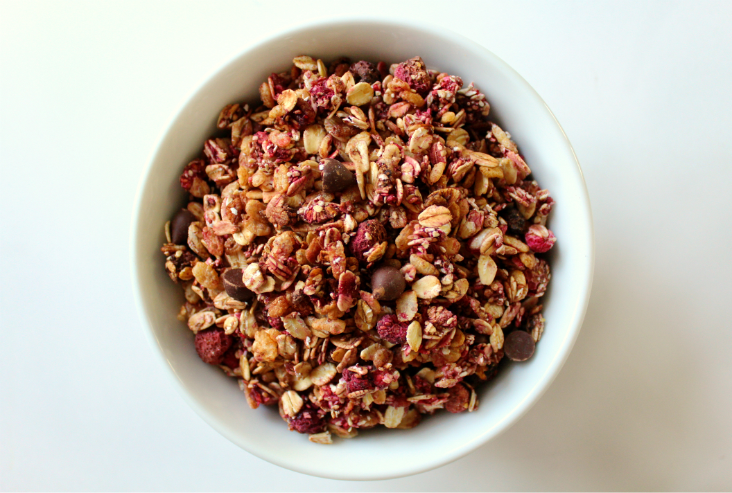 Chocolate Chip Raspberry Granola | Strength and Sunshine @RebeccaGF666 Perfectly sweet and tart, chocolate chip raspberry granola makes a lovely healthy breakfast or snack. Gluten-free. nut-free, and vegan with just a few simple ingredients, your granola craving can be satisfied in a snap!