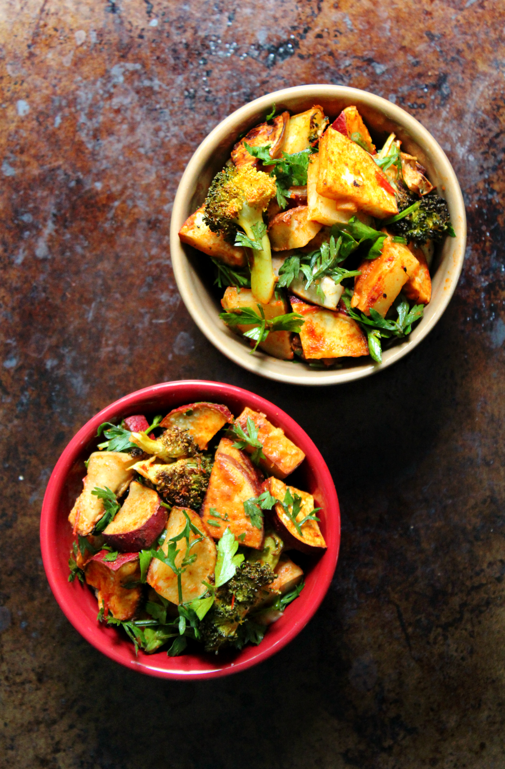 Harissa Potato Salad | Strength and Sunshine @RebeccaGF666 Two types of potatoes, broccoli, and eggplant roasted to perfection and paired with a smoky and spicy harissa sauce. A harissa potato salad, gluten-free, vegan, and paleo, that will elevate you bland dinner side dish to an all new level!