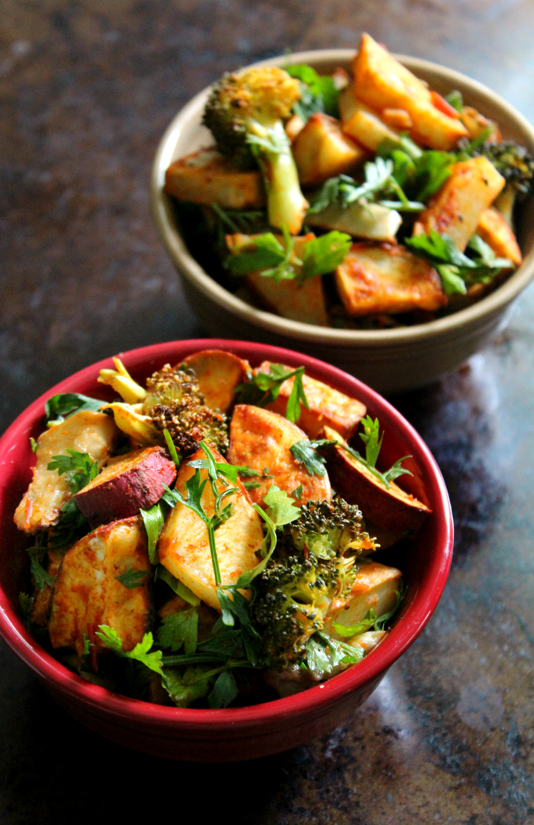 Harissa Potato Salad | Strength and Sunshine @RebeccaGF666 Two types of potatoes, broccoli, and eggplant roasted to perfection and paired with a smoky and spicy harissa sauce. A harissa potato salad, gluten-free, vegan, and paleo, that will elevate you bland dinner side dish to an all new level!