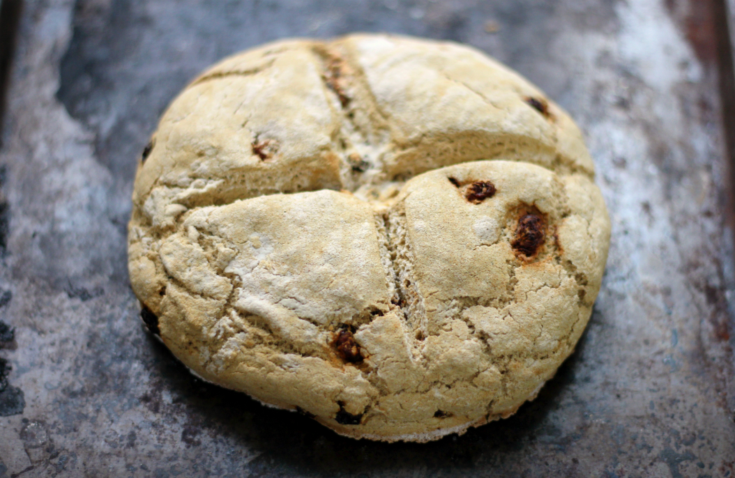 Traditional Gluten-Free Irish Soda Bread | Strength and Sunshine @RebeccaGF666 Everything a traditional Irish soda bread should be, only this one is gluten-free and vegan! A simple flour blend and spotted with raisins, everyone will feel the luck of the Irish with this simple soda bread recipe!