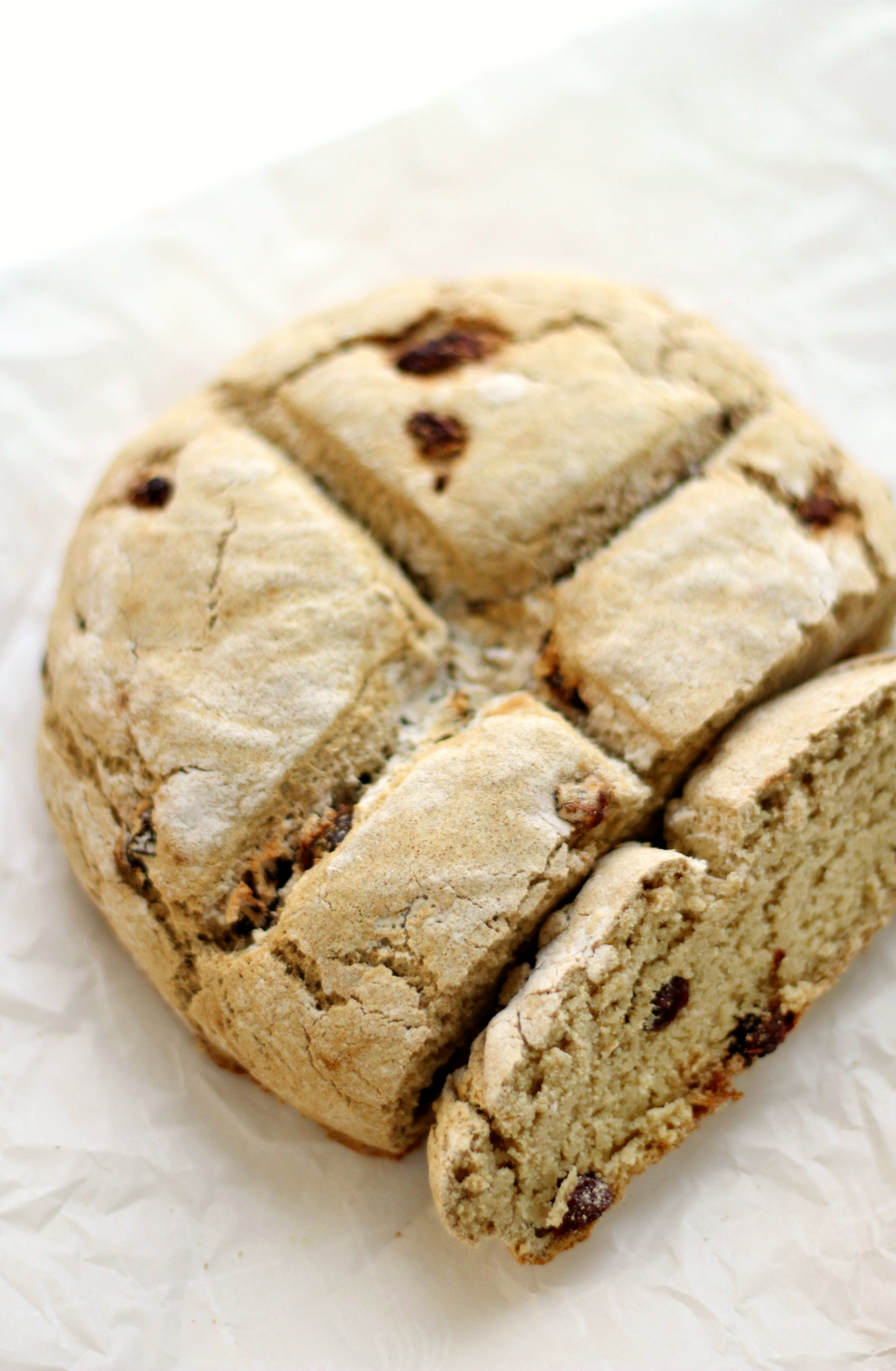 Traditional Gluten-Free Irish Soda Bread | Strength and Sunshine @RebeccaGF666 Everything a traditional Irish soda bread should be, only this one is gluten-free and vegan! A simple flour blend and spotted with raisins, everyone will feel the luck of the Irish with this simple soda bread recipe!