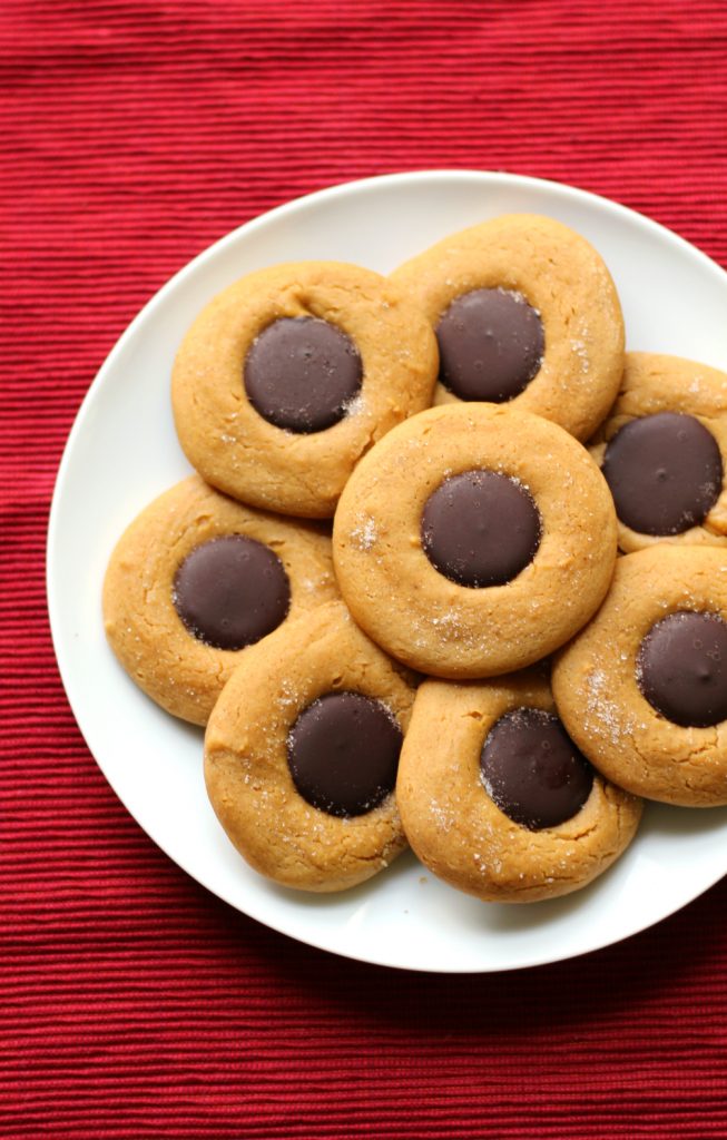 "No Butter" Peanut Butter Blossoms | Strength and Sunshine @RebeccaGF666 The healthiest peanut butter blossoms you'll find! Made with peanut flour, these cookies are not only gluten-free and vegan, but grain-free, sugar-free, and oil-free as well! A perfect healthy dessert to tame your craving!
