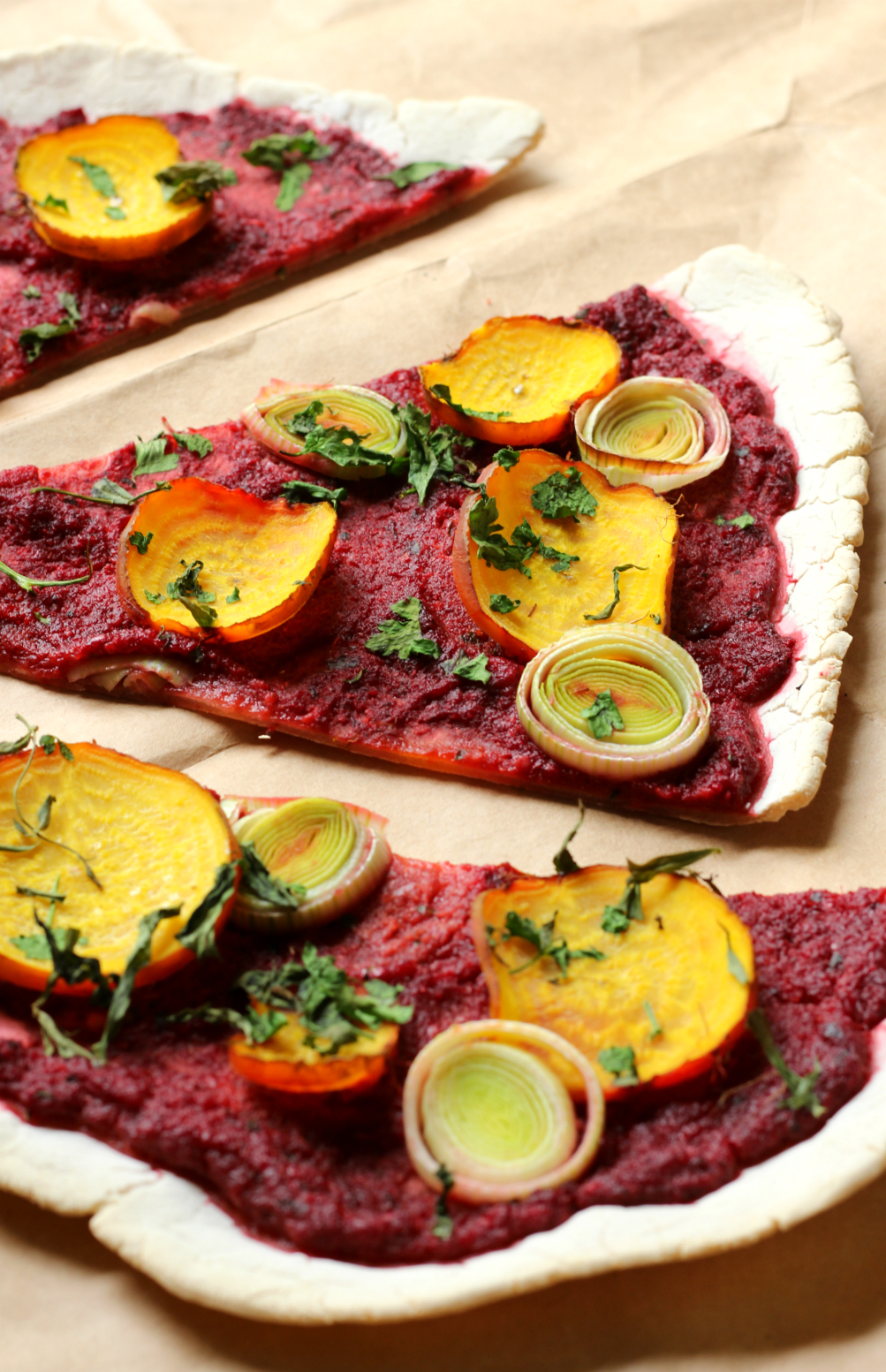 Beet & Leek Cassava Crust Pizza | Strength and Sunshine @RebeccaGF666 It's pizza time! A healthy beet & leek cassava crust pizza that's gluten-free, vegan, nut-free, and paleo. A fantastic whole food pizza recipe for a weeknight dinner, but fancy enough for a date night!