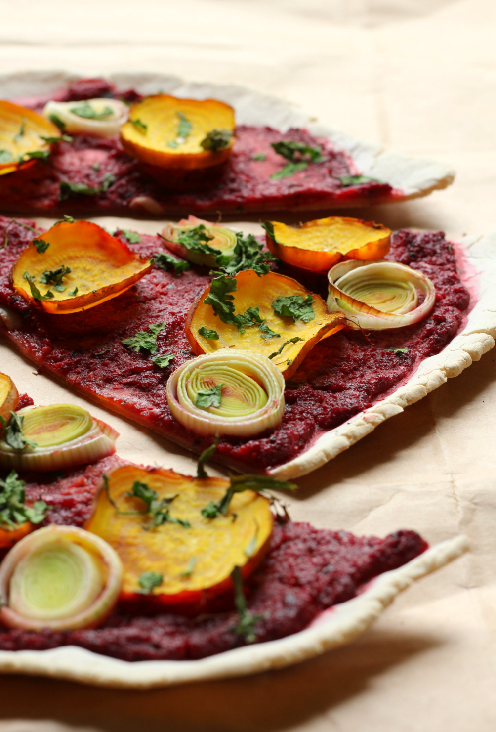 Beet & Leek Cassava Crust Pizza | Strength and Sunshine @RebeccaGF666 It's pizza time! A healthy beet & leek cassava crust pizza that's gluten-free, vegan, nut-free, and paleo. A fantastic whole food pizza recipe for a weeknight dinner, but fancy enough for a date night!