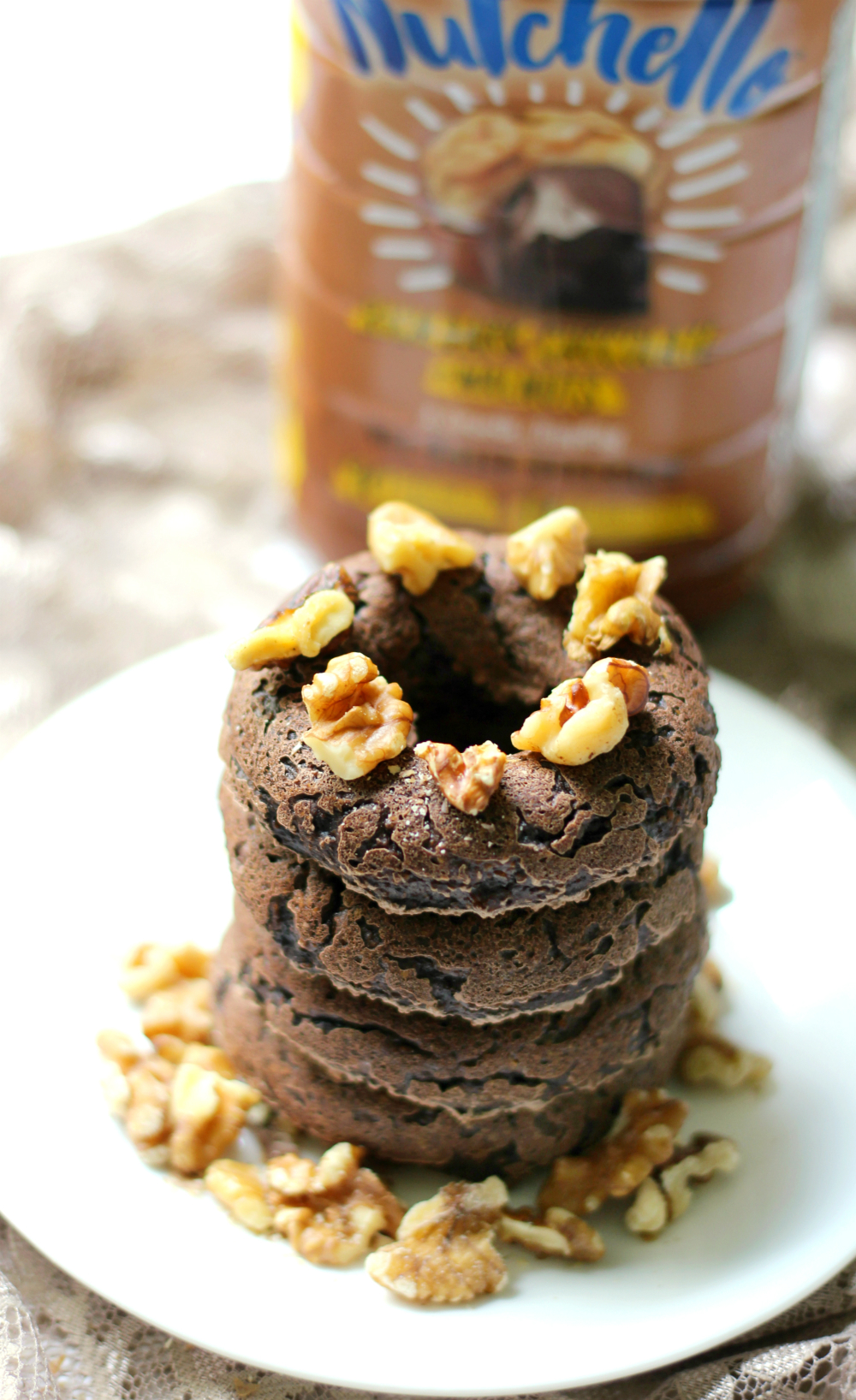 Dark Chocolate Walnut Doughnuts | Strength and Sunshine @RebeccaGF666 Decadent, but secretly healthy, Dark Chocolate Walnut Doughnuts! These gluten-free, vegan, & paleo doughnuts are baked breakfast perfection! Serve them with a cup of coffee or your afternoon tea! sponsored #SilkCrowd #Nutchello #lovemysilk @Silk
