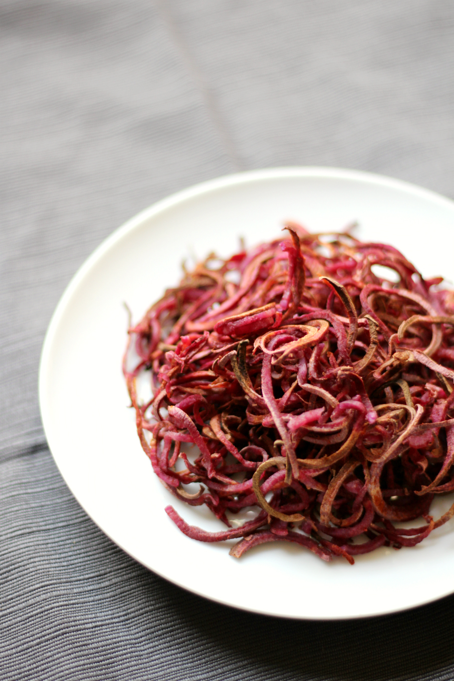 Smoky Spiralized Purple Sweet Potato Fries | Strength and Sunshine @RebeccaGF666 Take your fries up a few notches. These smoky spiralized purple sweet potato fries are anything but boring! Baked, crispy, colorful, & smoky! Gluten-free, vegan, paleo, & oil-free, these fries will change your life!