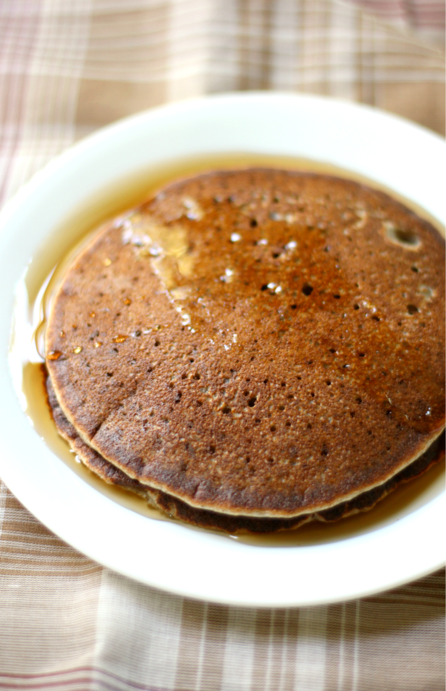 Banana Pumpkin Pancakes | Strength and Sunshine @RebeccaGF666 A sweet and healthy seasonal breakfast recipe for a lazy and cold weekend morning! Banana Pumpkin Pancakes that are gluten-free, vegan, allergy-free, and nut-free making them perfect for any hungry mouth that needs feeding!