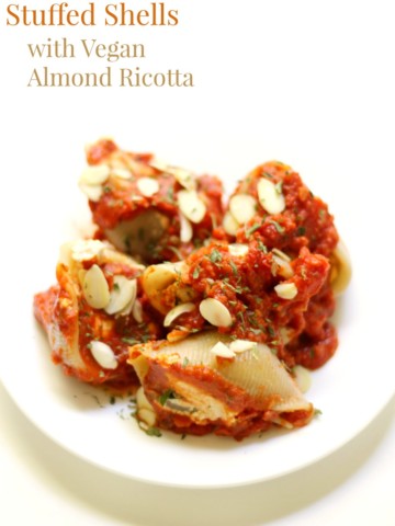 Gluten-Free Stuffed Shells with Vegan Almond Ricotta | Strength and Sunshine @RebeccaGF666 A classic Italian dinner recipe made-over so everyone can enjoy. Gluten-Free Stuffed Shells with Vegan Almond Ricotta and a homemade sun-dried tomato sauce! A cozy family meal that leaves bellies full and hearts warm!