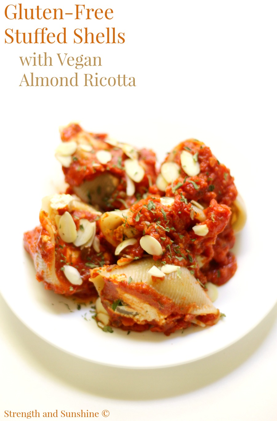 Gluten-Free Stuffed Shells with Vegan Almond Ricotta | Strength and Sunshine @RebeccaGF666 A classic Italian dinner recipe made-over so everyone can enjoy. Gluten-Free Stuffed Shells with Vegan Almond Ricotta and a homemade sun-dried tomato sauce! A cozy family meal that leaves bellies full and hearts warm!