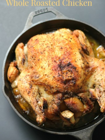 Easy Cast Iron Whole Roasted Chicken (Gluten-Free, Paleo) | Strength and Sunshine @RebeccaGF666 A simple and easy cast iron whole roasted chicken that's full of flavor, perfectly moist and tender, and just waiting to be served at the dinner table! This recipe is gluten-free, allergy-free, and paleo using a no-fail method for success!
