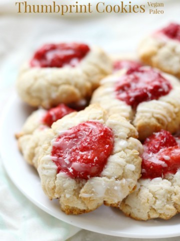 Paleo Strawberry Coconut Thumbprint Cookies (Gluten-Free, Vegan) | Strength and Sunshine @RebeccaGF666 Celebrate the Spring with a batch of Paleo Strawberry Coconut Thumbprint Cookies that are gluten-free, vegan, and grain-free! A fruity dessert recipe you'll be baking up beyond the season! ad #BobsSpringBaking