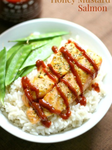 Sriracha Honey Mustard Salmon (Gluten-Free, Paleo) | Strength and Sunshine @RebeccaGF666 Spicy and tamed with a little sweetness! Sriracha Honey Mustard Salmon that's gluten-free, paleo, rich, and super flavorful! This recipe is an easy way to amp up the flavor and bring a healthy meal to the dinner table in a flash!