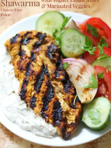Grilled Chicken Shawarma with Yogurt Tahini Sauce & Marinated Veggies (Gluten-Free, Paleo) | Strength and Sunshine @RebeccaGF666 A gluten-free and paleo grilled chicken shawarma recipe served with a dairy-free yogurt tahini sauce and marinated veggies. This Arabic meal packs in so much flavor and is guaranteed to be a showstopper dinner!