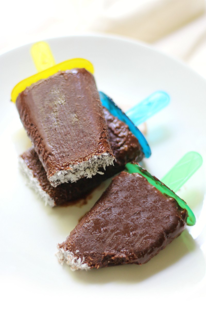 Vegan Coconut Fudgesicles (Gluten-Free, Allergy-Free, Paleo) | Strength and Sunshine @RebeccaGF666 A super easy frozen dessert for when you need a healthy chocolate indulgence! Vegan Coconut Fudgesicles that are also gluten-free, top 8 allergy-free, paleo, and even sugar-free! This 4 ingredient recipe can be whipped up in a snap and the only hard part is waiting for them to freeze!