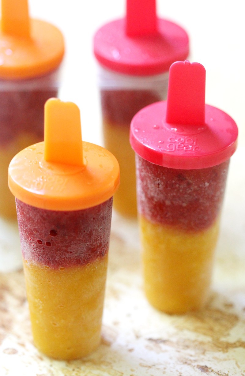 Easy 2-Ingredient Strawberry Mango Popsicles (No-Sugar Added) | Strength and Sunshine @RebeccaGF666 Don't let summer escape without enjoy all its perfectly sweet and natural fruit! These Easy 2-Ingredient Strawberry Mango Popsicles are made with the real fruit you love, no added sugar, and are gluten-free, vegan, paleo, and allergy-free! A great healthy snack or dessert for the kids to enjoy (or yourself!).