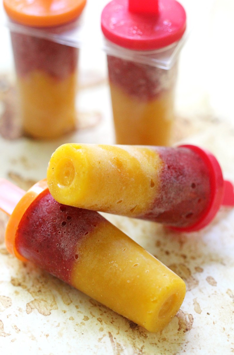 Easy 2-Ingredient Strawberry Mango Popsicles (No-Sugar Added) | Strength and Sunshine @RebeccaGF666 Don't let summer escape without enjoy all its perfectly sweet and natural fruit! These Easy 2-Ingredient Strawberry Mango Popsicles are made with the real fruit you love, no added sugar, and are gluten-free, vegan, paleo, and allergy-free! A great healthy snack or dessert for the kids to enjoy (or yourself!).