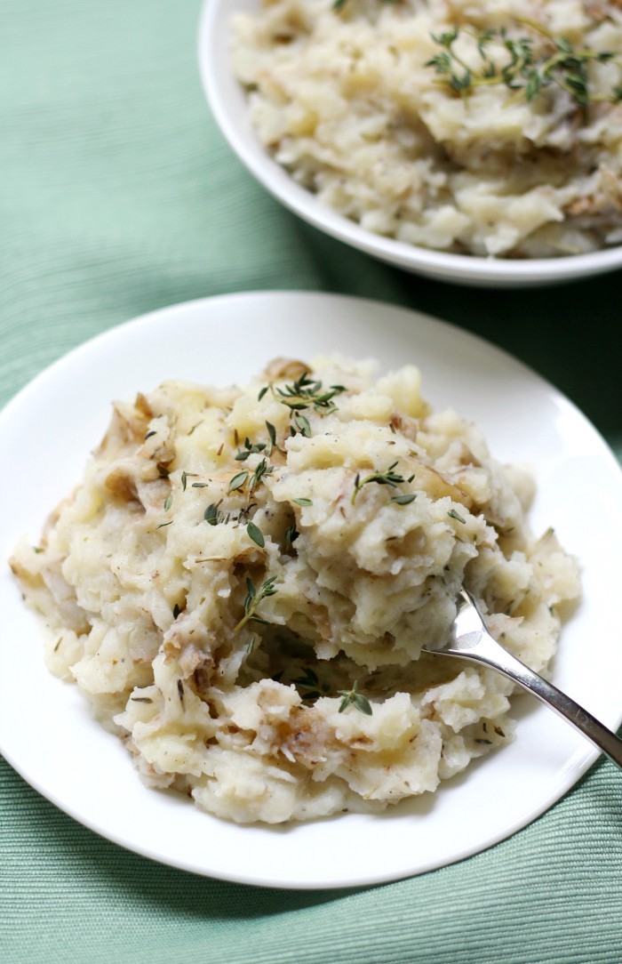 Rustic Rosemary Thyme Mashed Potatoes (Gluten-Free, Vegan, Paleo) | Strength and Sunshine @RebeccaGF666 An easy and delicious dinner side dish recipe for Rustic Rosemary Thyme Mashed Potatoes! They're gluten-free, vegan, paleo, and top-8 allergy-free; perfect for the holidays or as a simple healthy take on some good ole' comfort food! #mashedpotatoes #sidedish #holidays #glutenfree #vegan #paleo #allergyfree #potatoes #rosemary #thyme