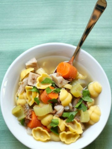 Vegan + Gluten-Free Chicken Noodle Soup (Allergy-Free, No Beans) | Strength and Sunshine @RebeccaGF666 Everyone loves a piping hot comforting bowl of classic chicken noodle soup! But this healthy & veggie-packed recipe is for Vegan & Gluten-Free Chicken Noodle Soup; top 8 allergy-free, no beans, and a mock ingredient you'd never guess! This cozy soup will nourish and soothe the soul! #soup #chickennoodlesoup #chickensoup #glutenfree #vegan #allergyfree #jackfruit