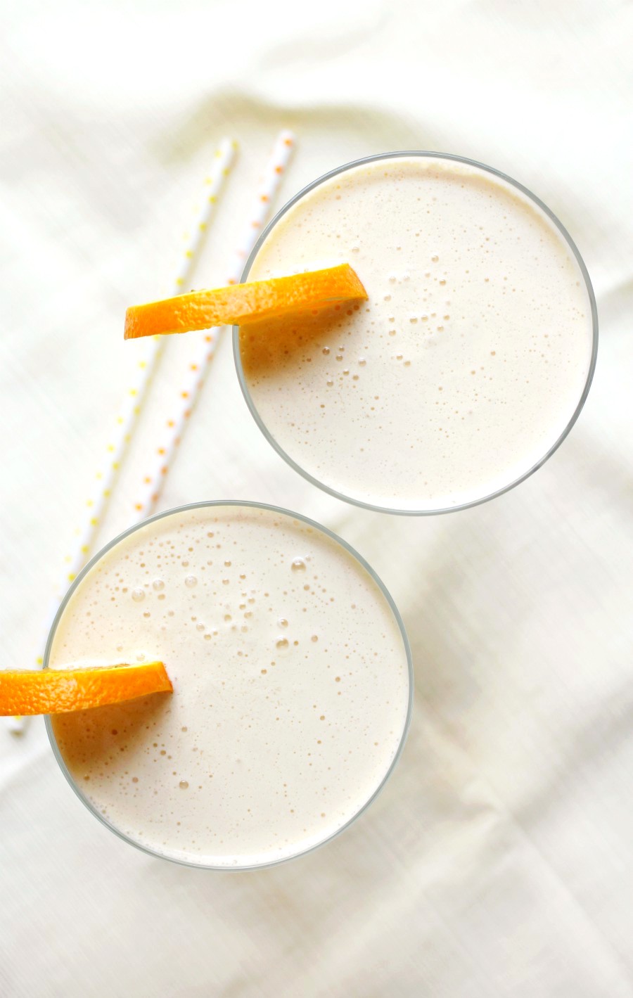 4-Ingredient Orange Julius Cocktail (Gluten-Free, Vegan) | Strength and Sunshine @RebeccaGF666 Give your Orange Julius a grown-up boozy twist! A quick and easy 4-Ingredient Orange Julius Cocktail recipe that's gluten-free, vegan, and makes for a perfect frozen, creamy, and fruit treat! A sippable Creamsicle for adults only! #orangejulius #creamsicle #cocktail #glutenfree #vegan 