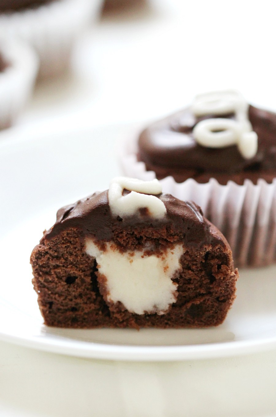 Homemade Gluten-Free + Vegan Hostess Cupcakes (Allergy-Free) | Strength and Sunshine @RebeccaGF666 A copycat recipe for your favorite American snack cake! Homemade Gluten-Free & Vegan Hostess Cupcakes that are top-8 allergy-free and a whole lot healthier! A chocolate cream-filled dessert for any occasion that is bound to bring back all the nostalgia of childhood! #glutenfree #vegan #cupcakes #hostesscupcakes #allergyfree