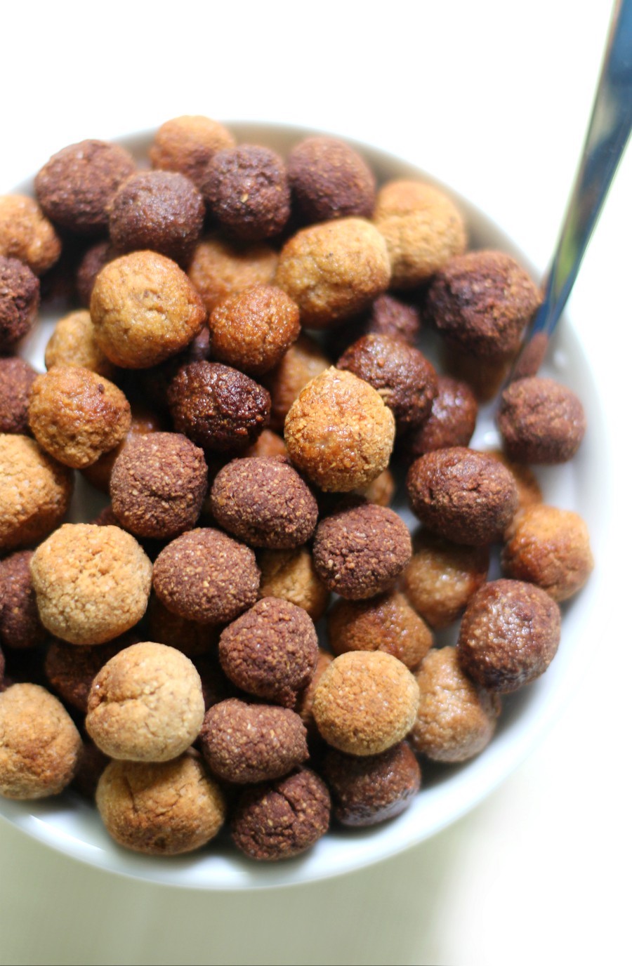 Copycat Gluten-Free Reese's Puffs Cereal (Vegan, Grain-Free) | Strength and Sunshine @RebeccaGF666 Healthy, protein-packed, homemade cereal for breakfast? You will love this recipe for Copycat Gluten-Free Reese's Puffs Cereal that's vegan, grain-free, and sugar-free! Chocolate and peanut butter flavors are just what you need to kickstart your day! #cereal #reeses #breakfast #glutenfree #vegan #grainfree #sugarfree #kidfriendly