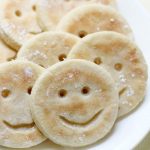 smiley face fries on plate