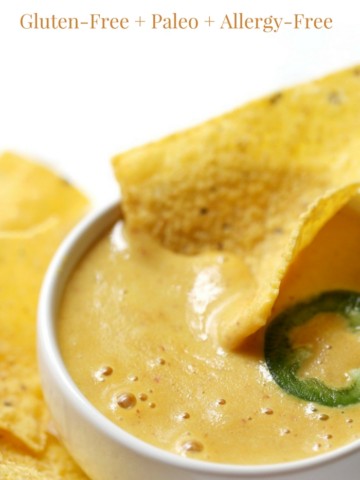 Creamy Nut-Free Vegan Nacho Cheese Sauce (Gluten-Free, Paleo, Allergy-Free) | Strength and Sunshine @RebeccaGF666 No dairy needed in this Creamy Nut-Free Vegan Nacho Cheese Sauce! Low-fat, gluten-free, paleo, and allergy-free; everyone can enjoy some healthy dipping! A tummy-friendly recipe, made quick & easy in a blender. You'll be using this sauce for more than just chips! #cheesesauce #nachocheesesauce #dairyfree #vegan #nutfree #strengthandsunshine