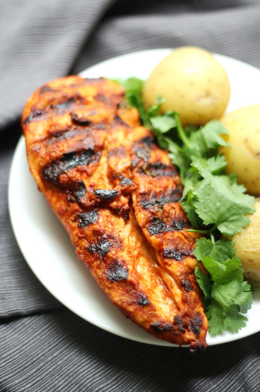 Grilled Peri-Peri Chicken (Gluten-Free, Paleo, Allergy-Free) | Strength and Sunshine @RebeccaGF666 A spicy North African recipe that will take your plain grilled chicken up a notch! Marinated in a spicy, zesty sauce, this Grilled Peri-Peri Chicken is loaded with flavor, gluten-free, paleo, top 8 allergy-free, and perfect for any cookout, bbq, or dinner! 