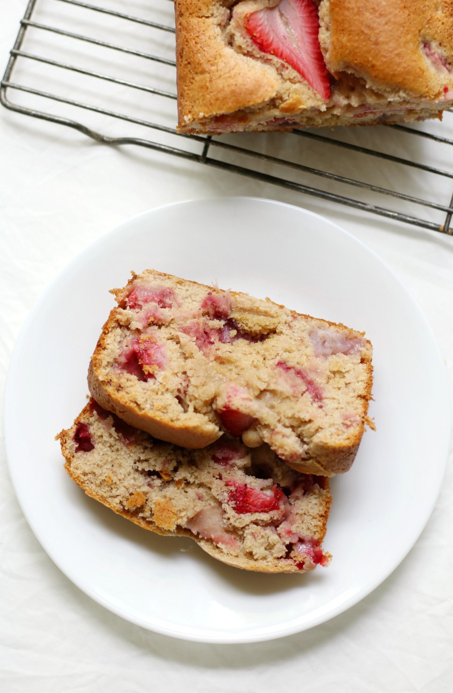 Gluten-Free Strawberry Quick Bread (Vegan, Allergy-Free) | Strength and Sunshine @RebeccaGF666 Put those ripe strawberries to good use in this healthy, sweet, and delicious quick bread recipe! This Gluten-Free Strawberry Quick Bread is vegan, allergy-free, and perfect for breakfast, brunch, dessert, or as a seasonal snack! It's spring and summer baking at its finest! 