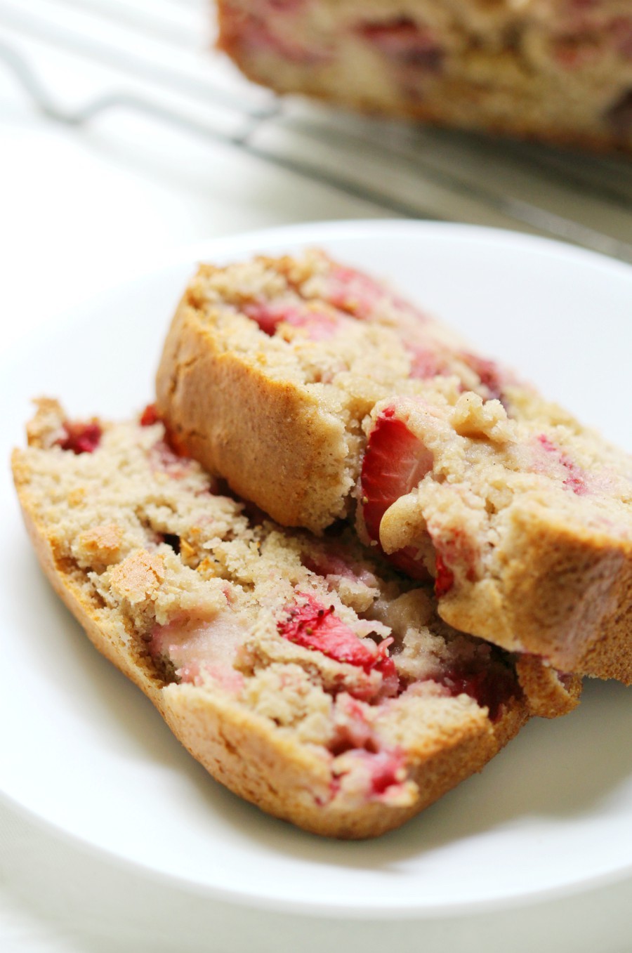 Gluten-Free Strawberry Quick Bread (Vegan, Allergy-Free) | Strength and Sunshine @RebeccaGF666 Put those ripe strawberries to good use in this healthy, sweet, and delicious quick bread recipe! This Gluten-Free Strawberry Quick Bread is vegan, allergy-free, and perfect for breakfast, brunch, dessert, or as a seasonal snack! It's spring and summer baking at its finest! 