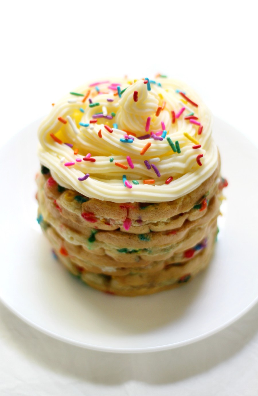 Gluten-Free Funfetti Waffle Cake (Vegan, Allergy-Free) | Strength and Sunshine @RebeccaGF666 A fun way to celebrate any occasion! This colorful Gluten-Free Funfetti Waffle Cake is vegan, top 8 allergy-free, requires minimal ingredients, while still being a dessert (or breakfast) recipe to remember! Whether it's a birthday or fun milestone, kids and adults this fun and easy creation!