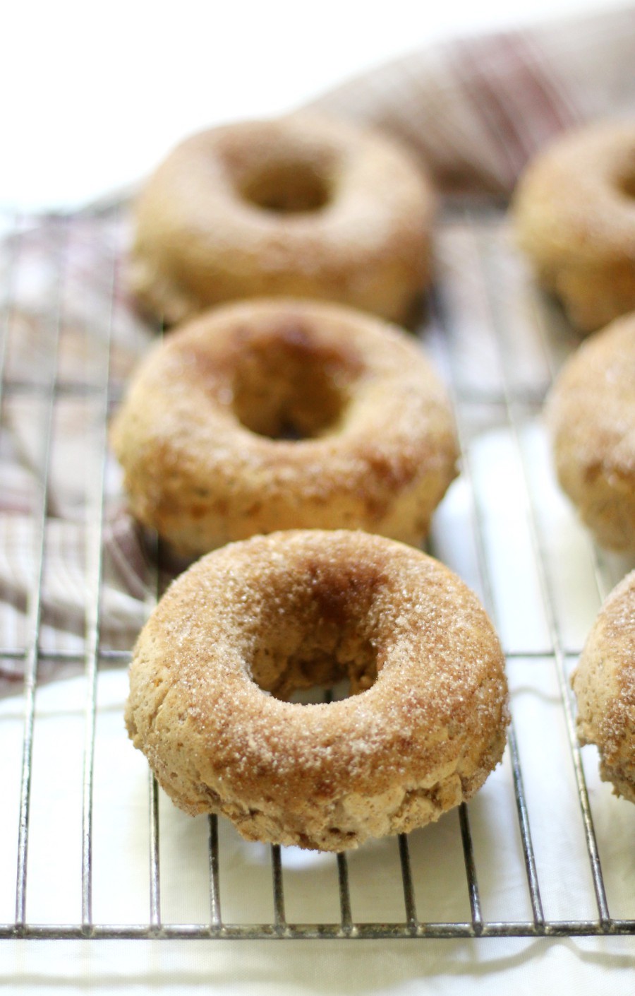 baked-apple-cider-doughnuts-on-wire-rack