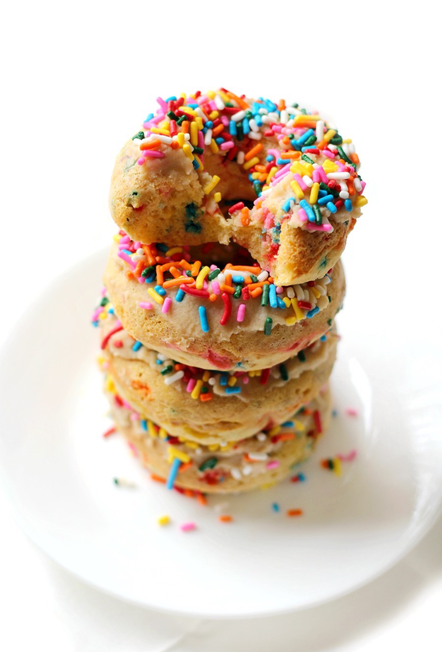 funfetti-doughnut-stack-bitten-doughnut-top