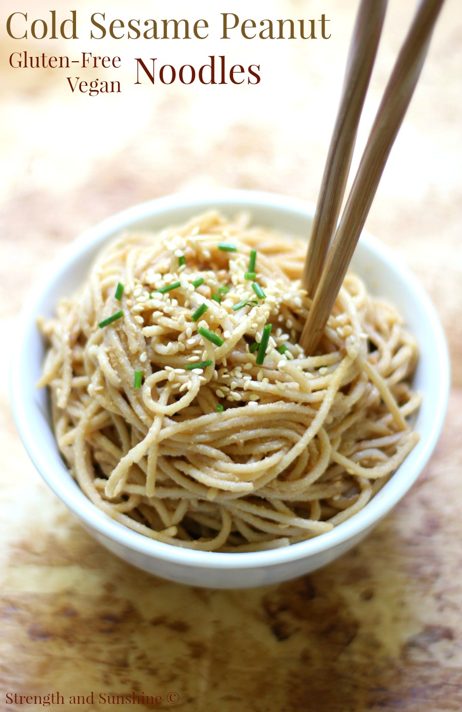 cold peanut sesame noodles in bowl with image text