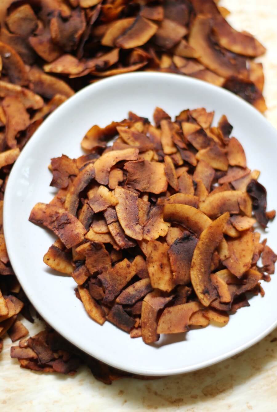 coconut bacon on a grey plate