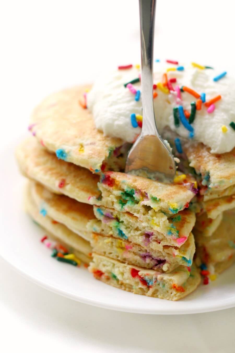 close up of a forkful of gluten-free funfetti pancakes