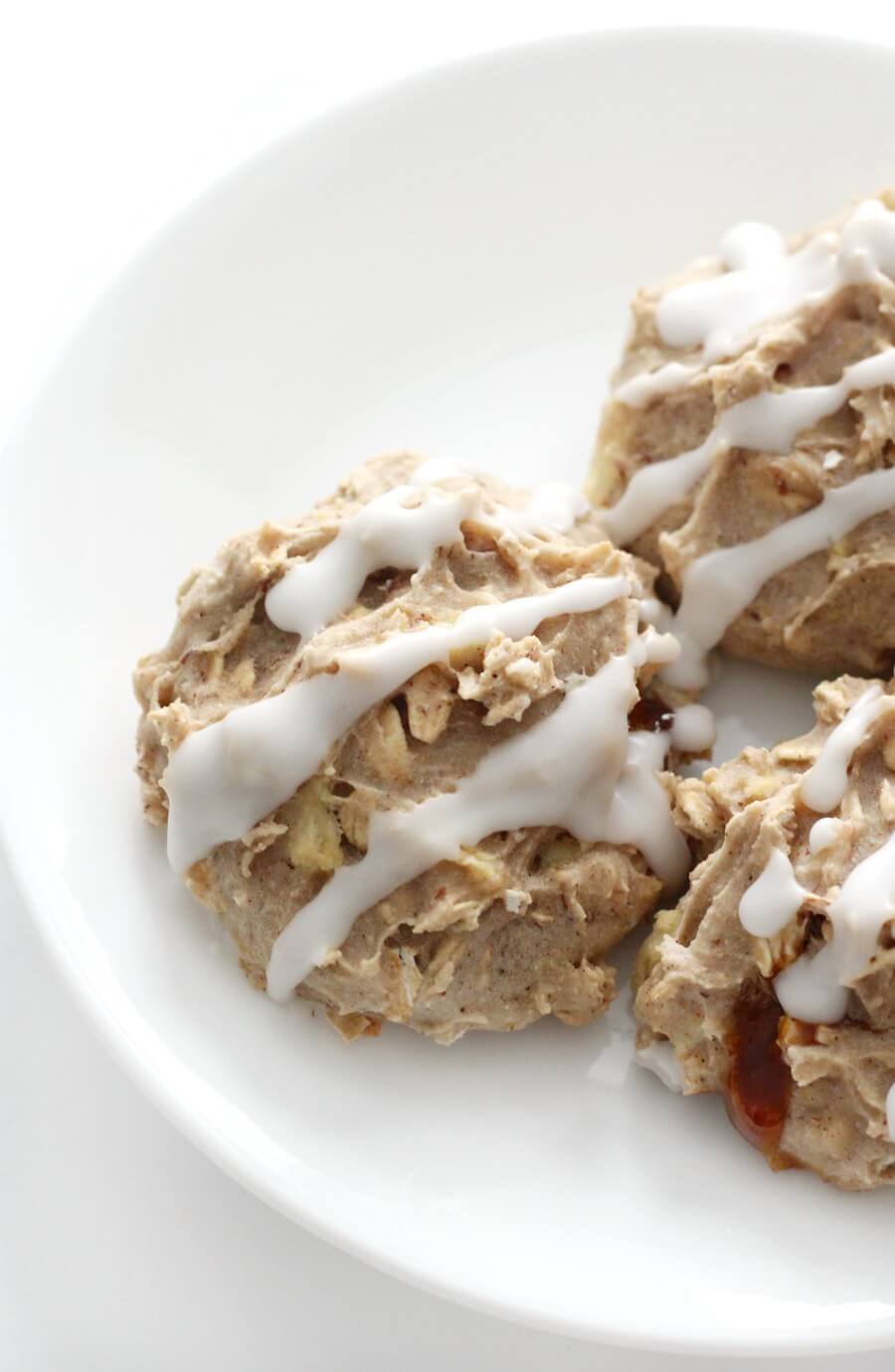 icing drizzled stuffed caramel apple cookies